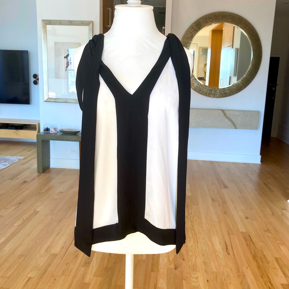 BCBG small, racer back blouse.  Great condition.